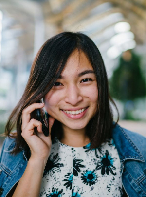 Smiling woman on phone