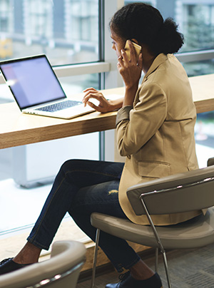 Woman using multiple devices