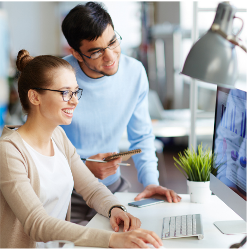 Couple looking at computer screen image