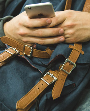 Young person using mobile phone