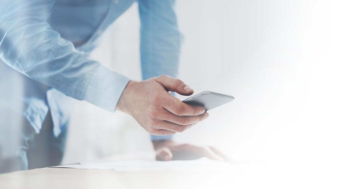 Man using social media on his phone