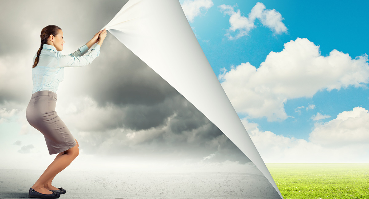 woman pulling back clouds curtain